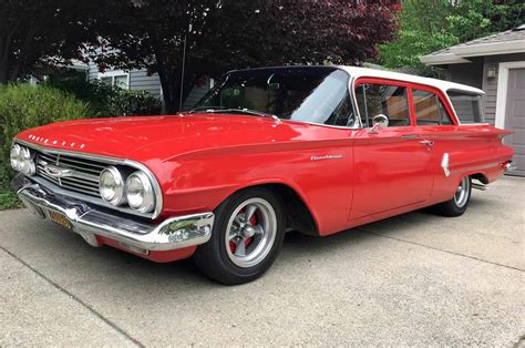 This <strong>1960 Chevrolet</strong> Brookwood four door <strong>station wagon</strong> originally finished in Horizon Blue is now finished in Ermine White with a two-tone red and white interior. . 1960 chevrolet station wagon